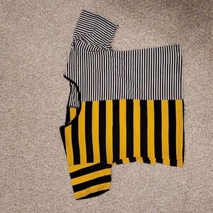 Black, white and yellow split crop top. Size small, no tags